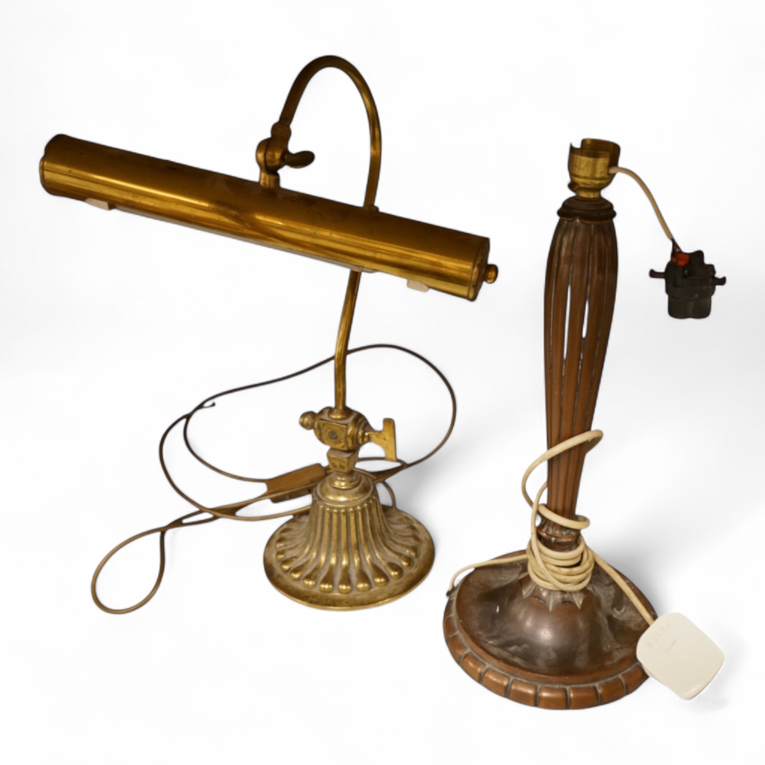 A copper table lamp and a brass students lamp